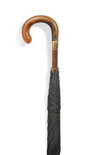 Lot 759 - A George V gold mounted umbrella with rhino horn handle