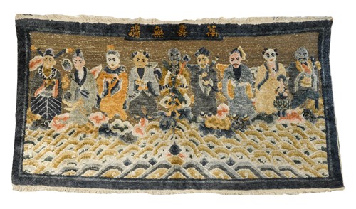 Lot 71 - A Chinese wool/silk mix small rug, early 20th century