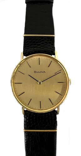 Lot 334 - Bulova - A 9ct gold wristwatch