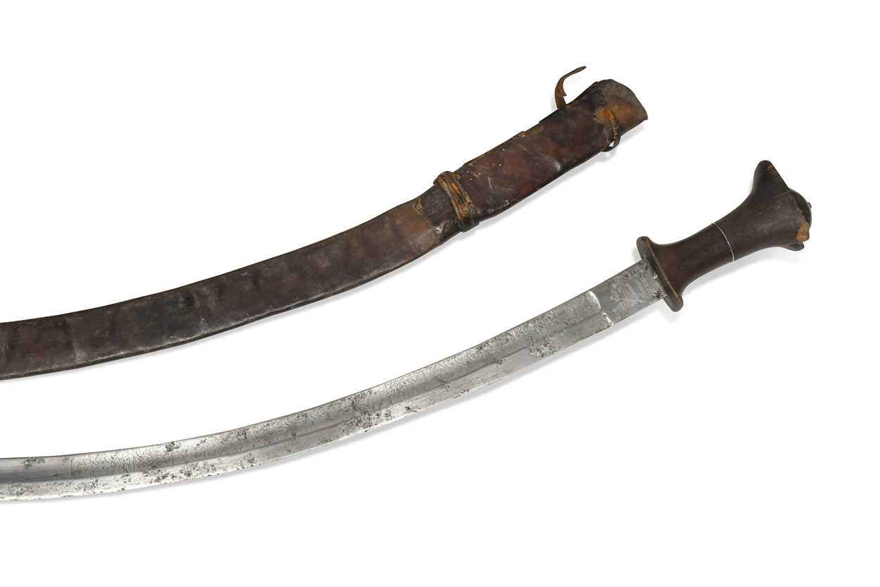 Lot 811 - An Ethiopian Gurade sword with rhino horn handle, 19th century