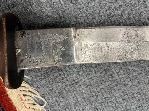 Lot 811 - An Ethiopian Gurade sword with rhino horn handle, 19th century