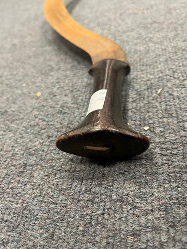 Lot 811 - An Ethiopian Gurade sword with rhino horn handle, 19th century