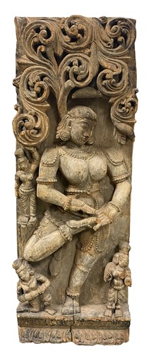 Lot 121 - An Indian high relief carved wood panel depicting Shiva and three acolytes, 19th/20th century