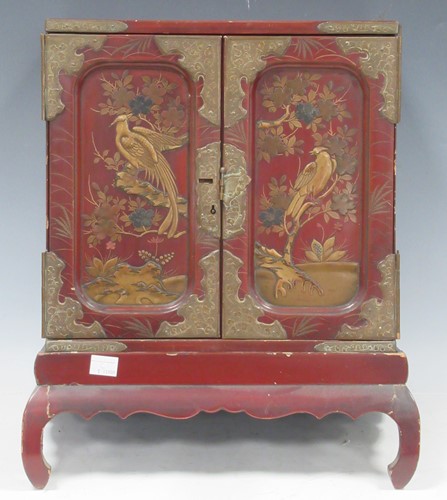 Lot 59 - Small Japanese lacquer cabinet on stand, early...