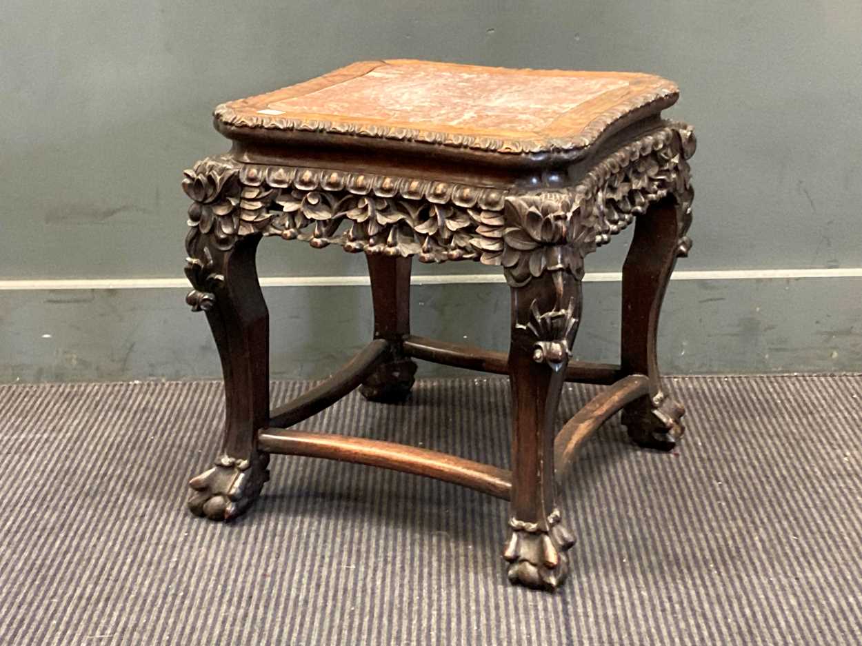 Lot 406 - A Chinese hard wood urn stand with marble...