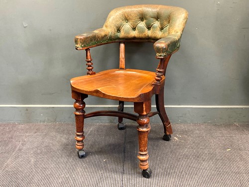 Lot 350 - A late Victorian horseshoe shaped desk chair...