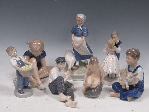 Lot 120 - Five Royal Copenahagen figures, to include...