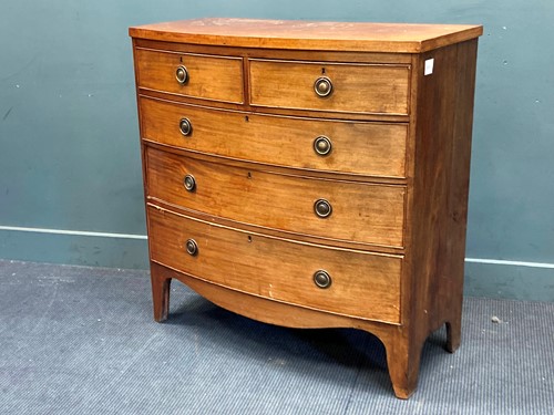 Lot 408 - A 19th century mahogany bow front chest of...