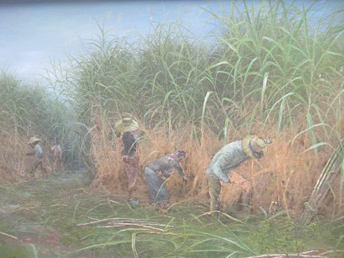 Lot 219 - Far East School, date 1979, cutting cane, oil...