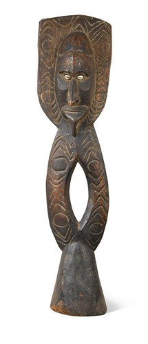 Lot 699 - A carved wood figure, Papua New Guinea, probably 19th century