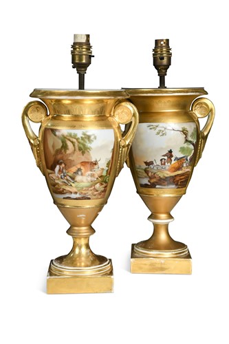 Lot 729 - A pair of Paris porcelain two-handled  gilt vases, now converted to lamps