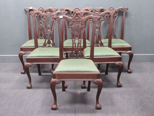 Lot 890 - A set of six Chippendale style dining chairs