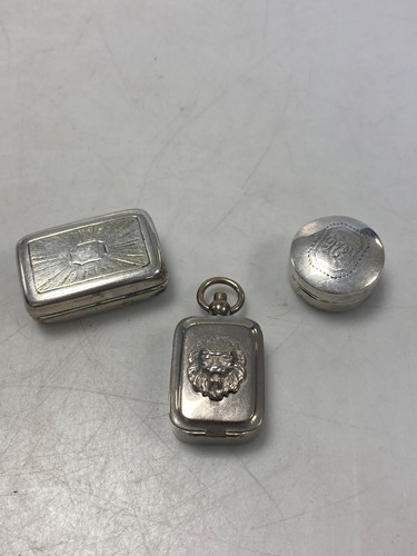 Lot 186 - Two silver vinaigrettes together with a base...