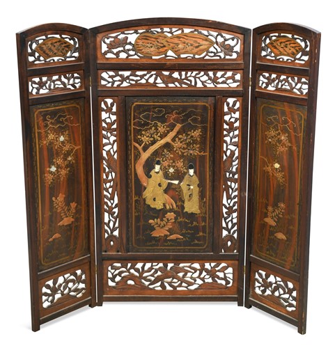 Lot 93 - A Japanese carved and lacquered faux rosewood triple-panel room screen, late Meiji Period