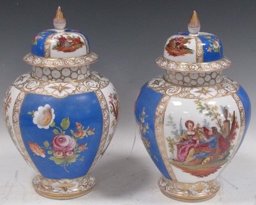 Lot 108 - A pair of Dresden lidded vases (one neck...