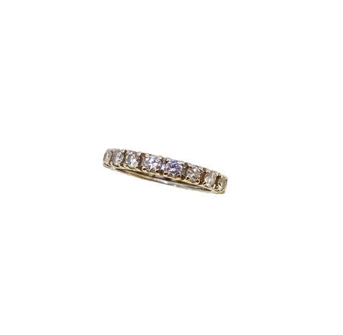 Lot 223 - A diamond set full eternity ring