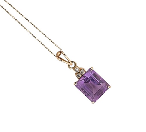 Lot 82 - An amethyst and diamond pendant and chain