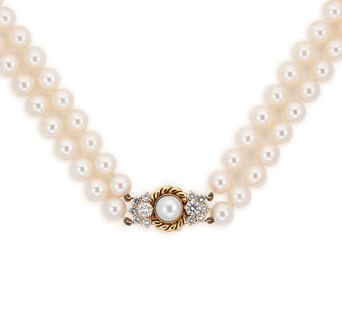 Lot 192 - A double row pearl necklace with a diamond set clasp