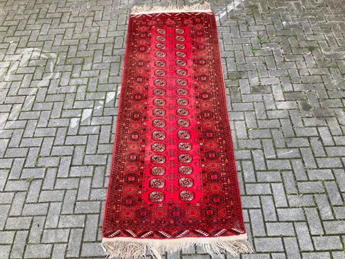 Lot 489 - A Bokhara type runner 283 x 103cm and two...