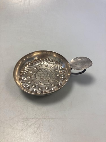 Lot 185 - A French metalwares silver tastevin by...