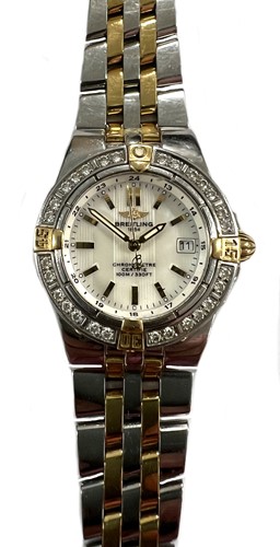 Lot 342 - Breitling - A diamond set two-colour 'Starliner' wristwatch