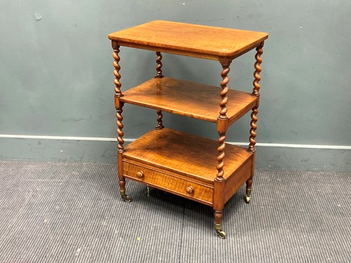 Lot 337 - A Victorian walnut three-tier whatnot with...