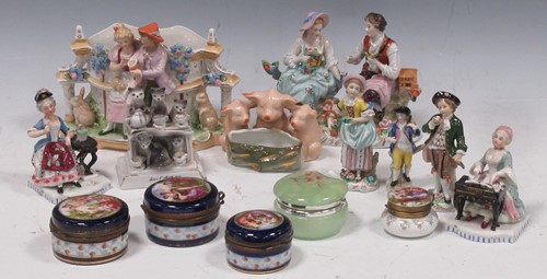 Lot 46 - A Continental porcelain group of a seat couple,...