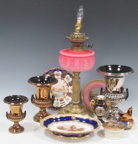 Lot 69 - A late Victorian brass oil lamp with pink...
