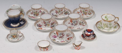 Lot 18 - A set of six Dresden porcelain coffee cups and...