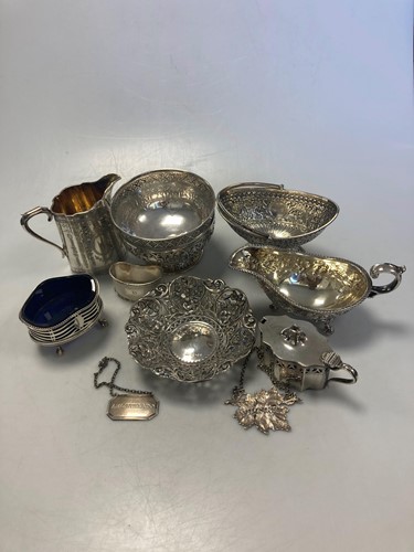 Lot 190 - A collection of silverware including milk jugs,...
