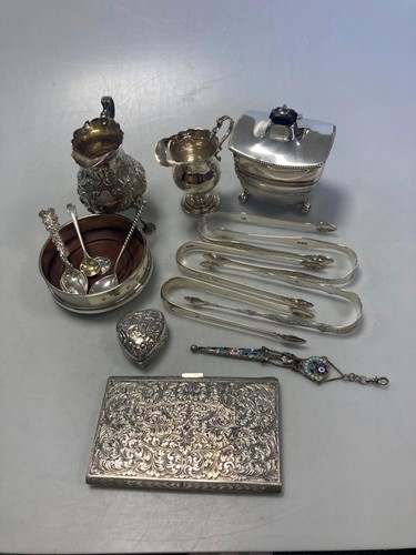 Lot 191 - A collection of silverware including sugar...