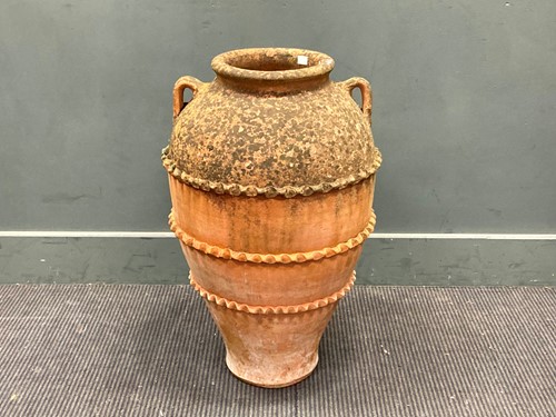 Lot 469 - A terracotta garden planter 68cm high