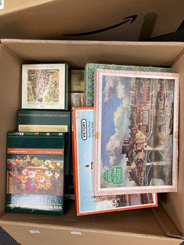 Lot 104 - A large collection of various jigsaws Leeds...