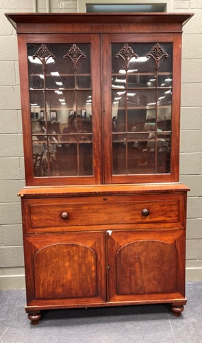 Lot 701 - A 19th century mahogany secretaire bookcase...