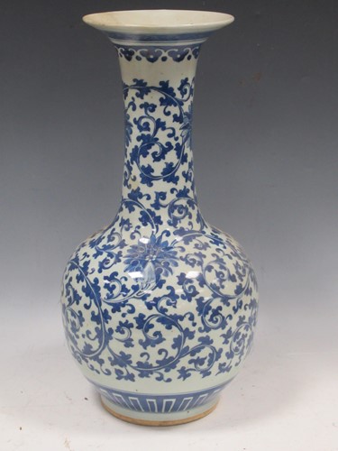Lot 39 - A 19th century Chinese blue and white bottle...