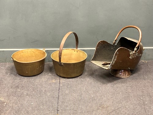 Lot 60 - Two brass jam pans together with a copper coal...