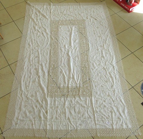 Lot 139 - A lacework bed spread, the pierced detail...