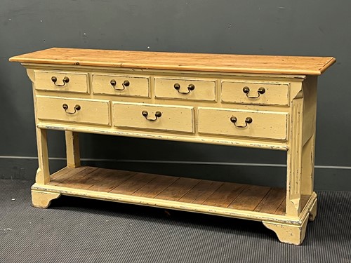 Lot 848 - A cream painted dresser base 83 x 161 x 41cm