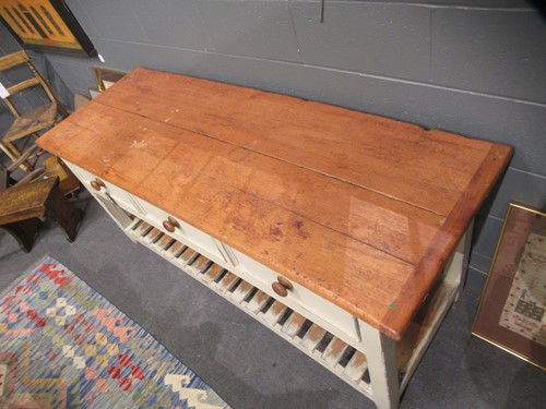 Lot 668 - A cream painted kitchen dresser base, 20th century