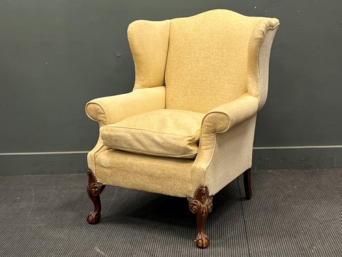 Lot 697 - George II style cream upholsted wing back...