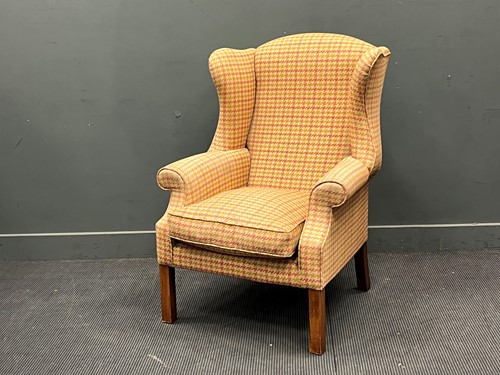 Lot 696 - Wing back armchair upholsterd in hounds tooth