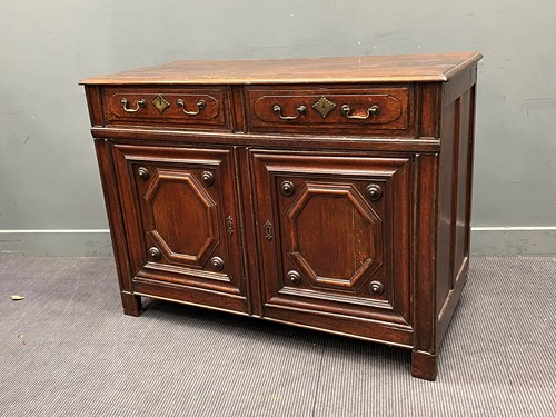 Lot 652 - A 19th century Continental oak dresser base...