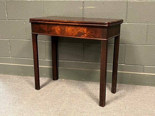 Lot 749 - A George III mahogany fold over tea table 73 x...