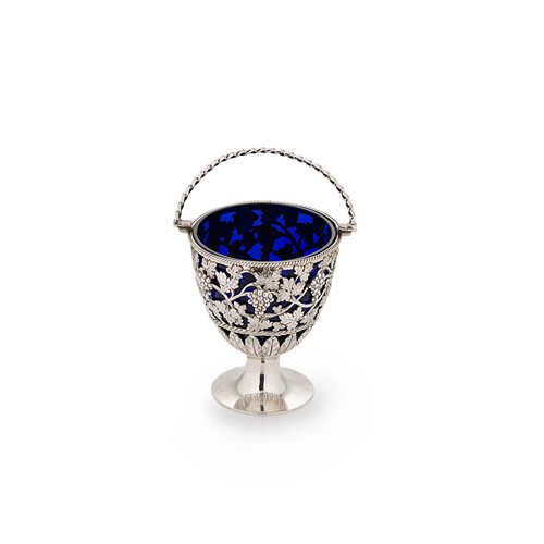 Lot 484 - A George III 18th century silver swing handled sugar basket
