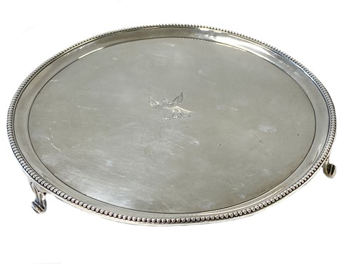 Lot 487 - A George III 18th century silver waiter