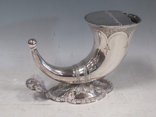 Lot 204 - A silver plated horn shaped spoon warmer, base...