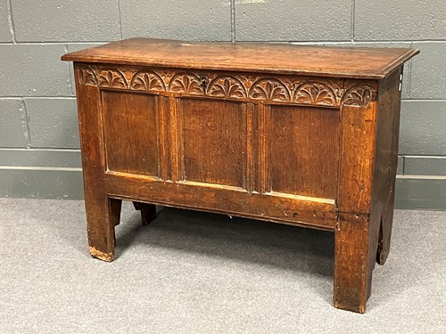 Lot 726 - An oak plank chest with panelled front 73 x...
