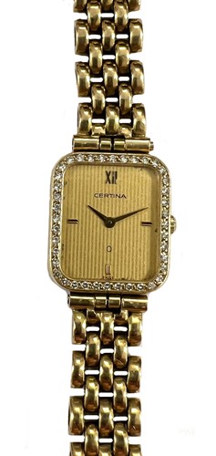 Lot 345 - Certina - A Swiss 18ct gold diamond set wristwatch