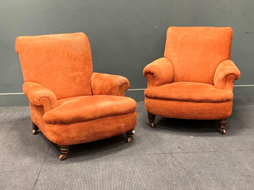 Lot 443 - A matched pair of Edwardian deep armchairs 82...