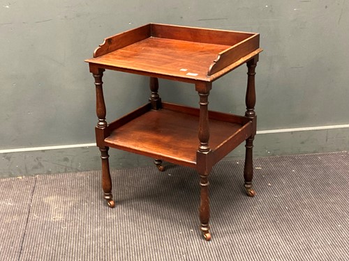 Lot 447 - A 19th century mahogany two-tier whatnot with...